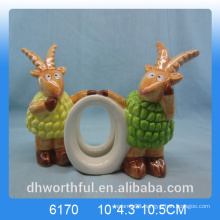 Lovely ceramic paper napkin ring with goat figurine